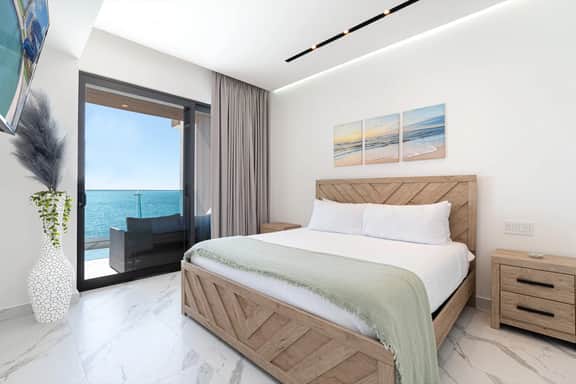 Beachfront 2BR Condo | Pool, Ocean Views & Resort